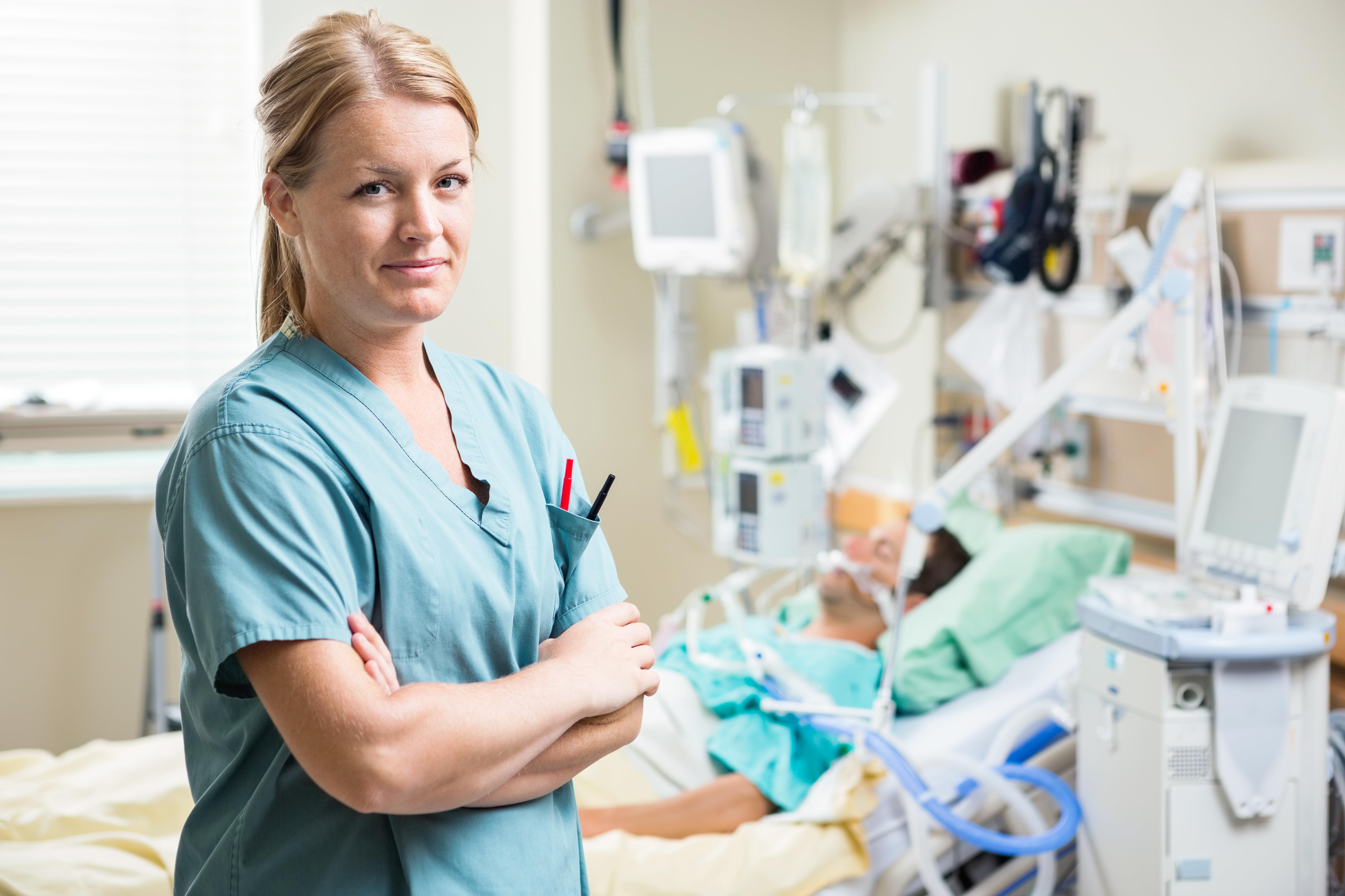 critical care nurse with patient